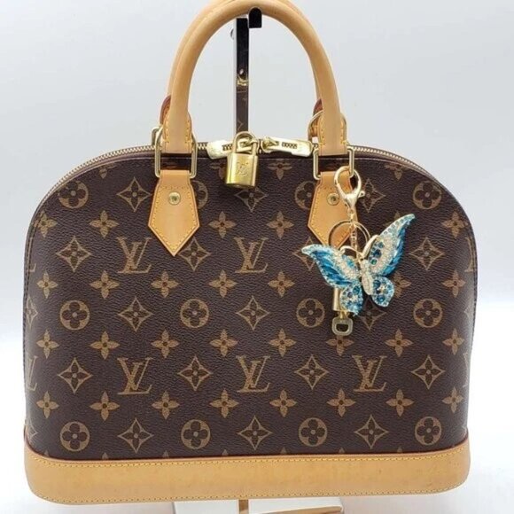 Authentic Louis Vuitton Lock & Key with unbranded Butterfly Bagcharm, Keycharm - Picture 6 of 6